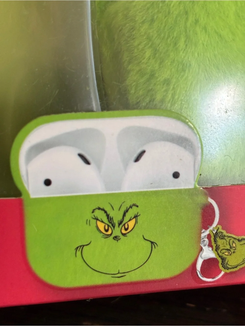 The Grinch Plush AirPods Pro Case in Bright Green with Keyring
